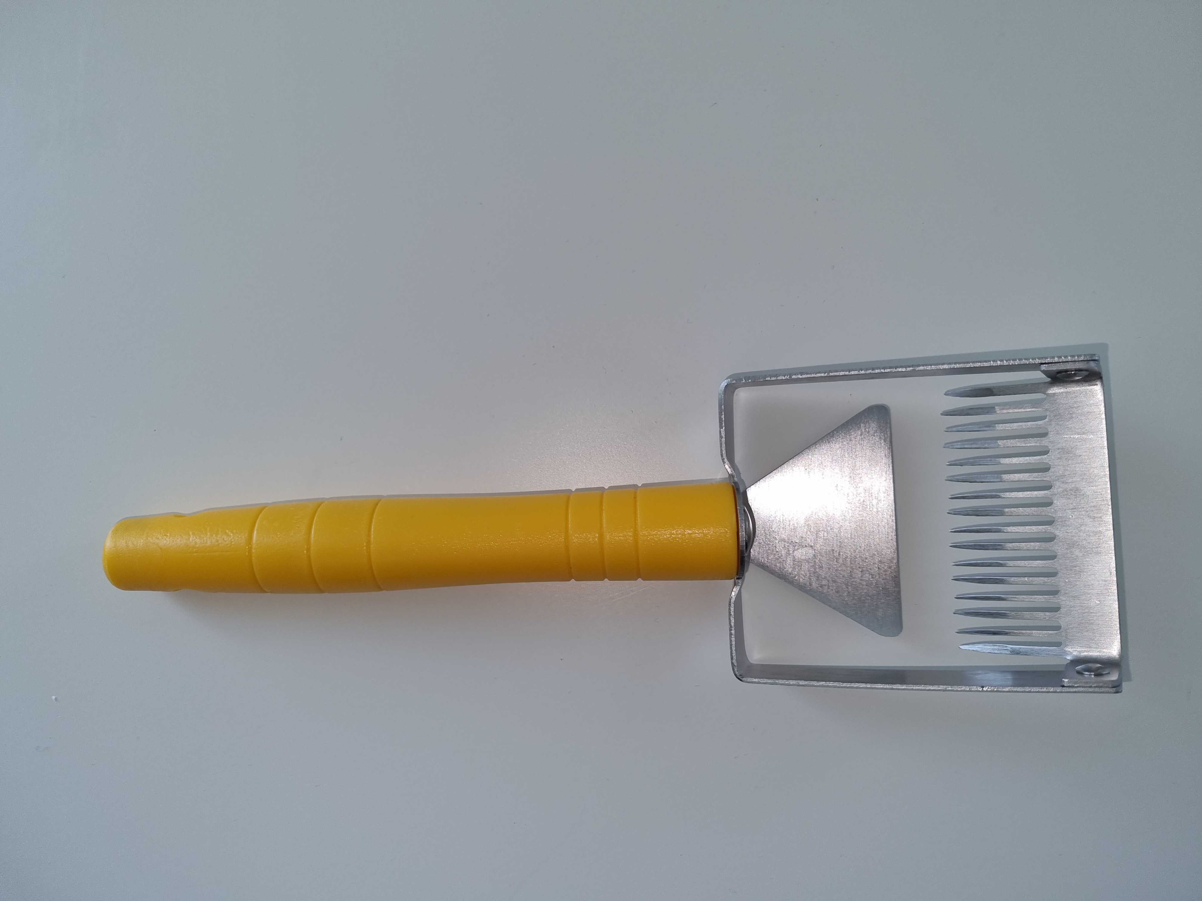 Entdeckelungsgabel mit Schaber und Kunststoffgriff gelb ca. 7,5 cm breit